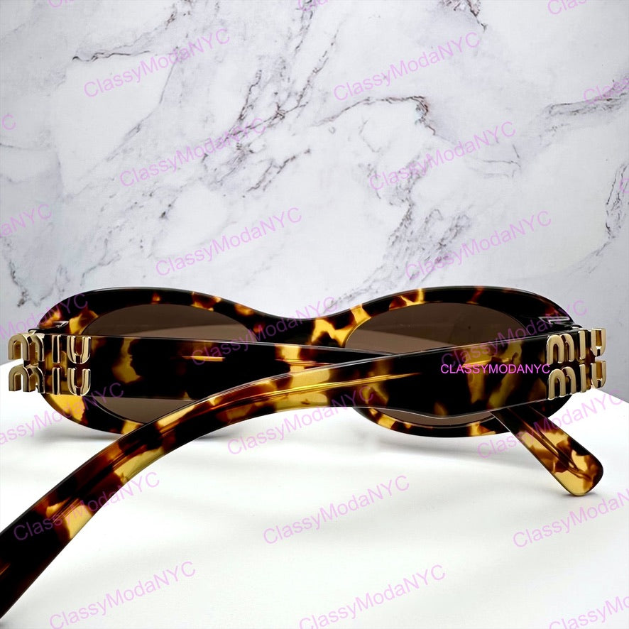 MU 06ZS VAU06B MIU MIU Sunglasses brown oval 