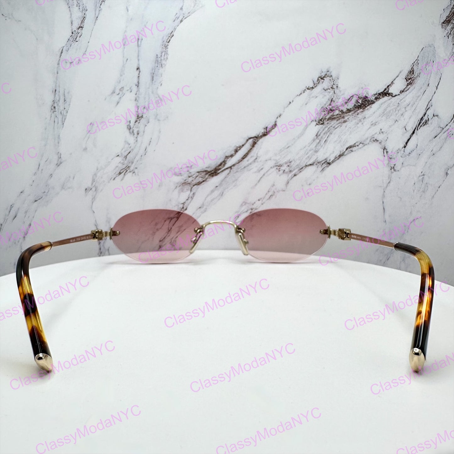 MU A54S ZVN70O MIU MIU gold pink sunglasses 