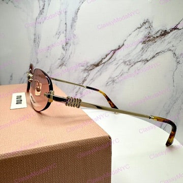 MU A54S ZVN70O MIU MIU sunglasses 7