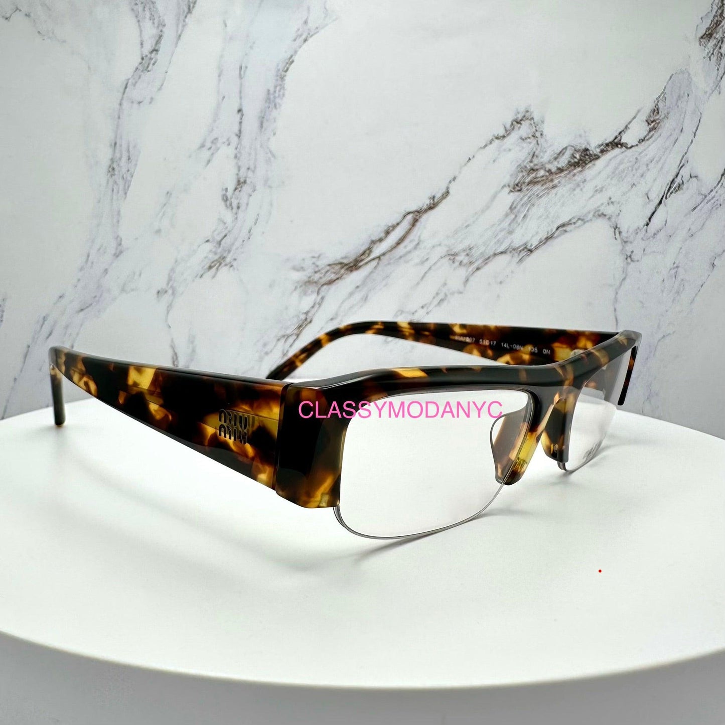 MIU MIU 0MUB07S 14L08N brown tortoise vedette sunglasses side view