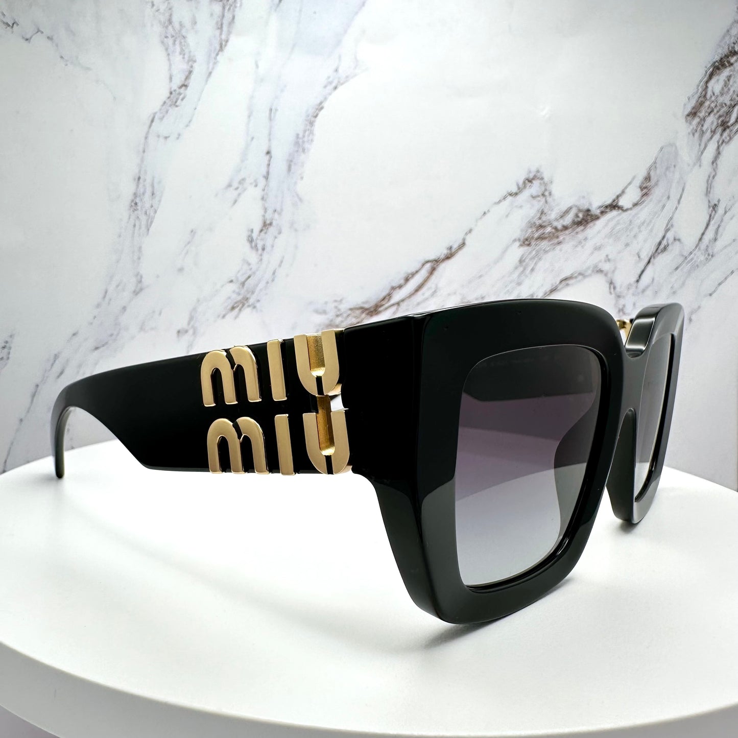 SMUB05 16K90A Miu Miu black square oversized sunglasses with gold logo 