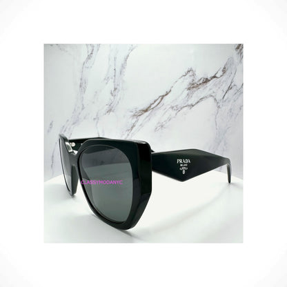 PRADA PR 19ZS 1AB5S0 black oversized butterfly women’s sunglasses with silver Symbole logo and acetate frame.