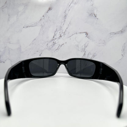 PRADA 0PRA14S 1AB5S0 black symbole logo wrap sunglasses back view