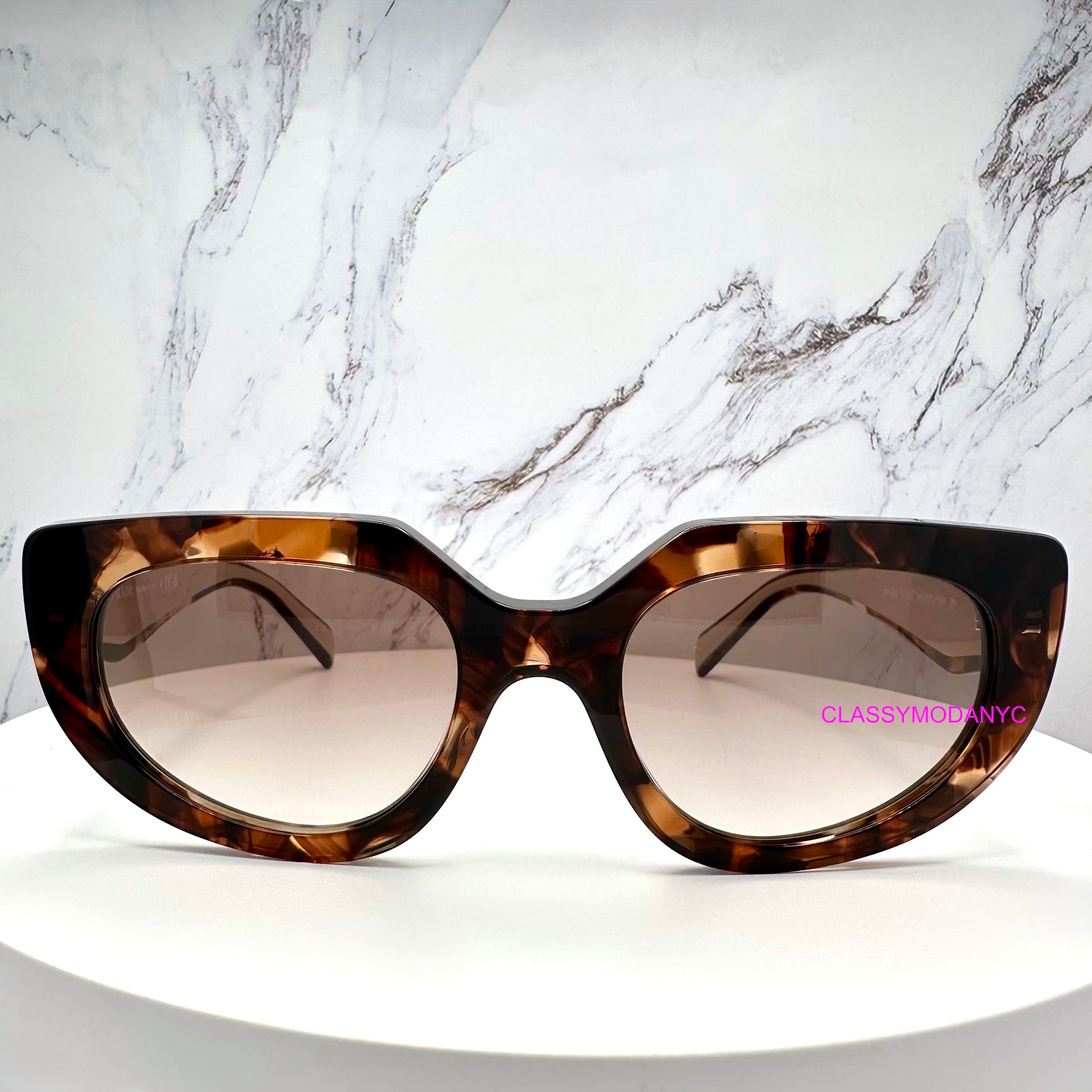 PR D02S 00K10S Prada sunglasses front view cat eye oval symbol gold logo 