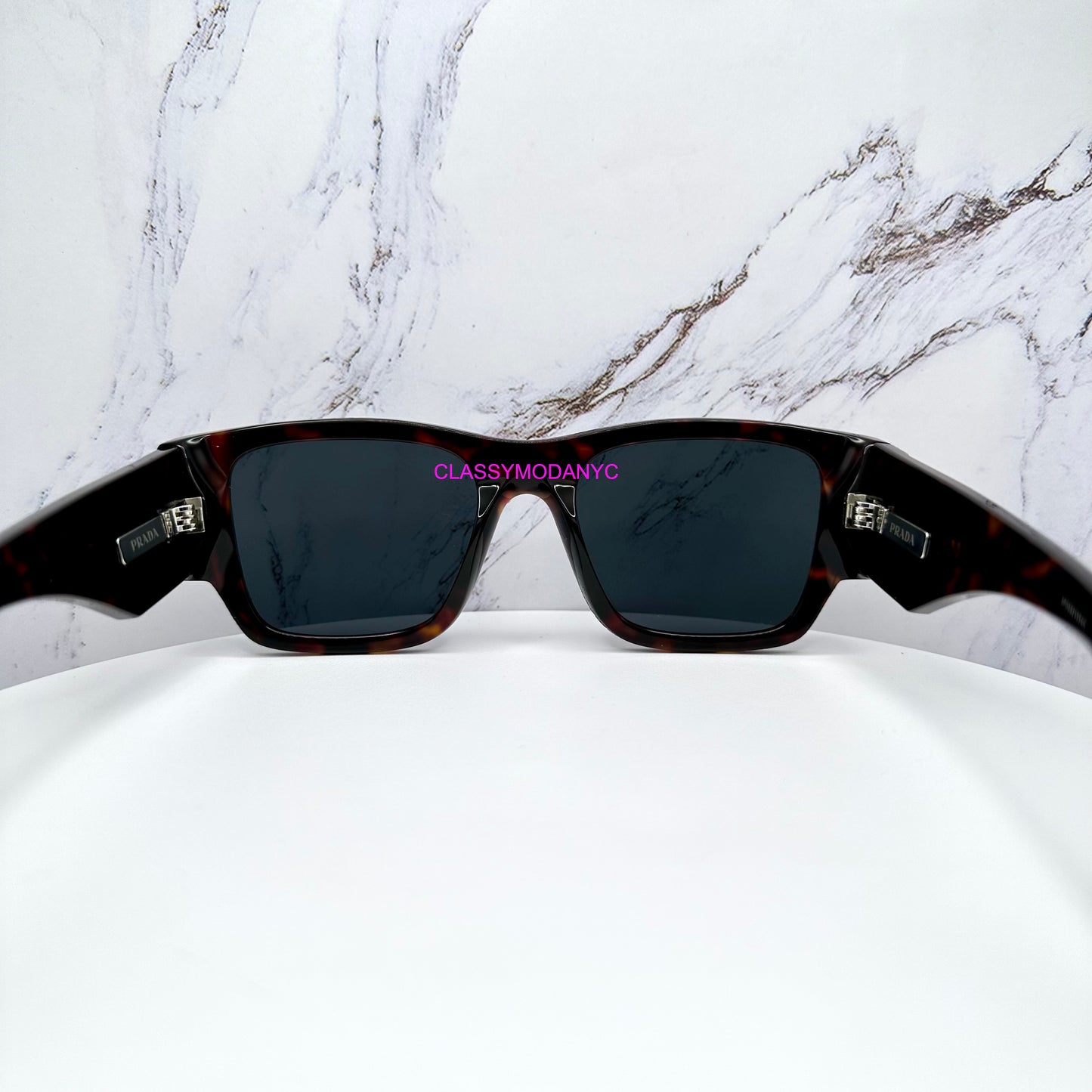 PR 10ZS 17N70B Prada Sunglasses brown tortoise with triangle plaque logo 