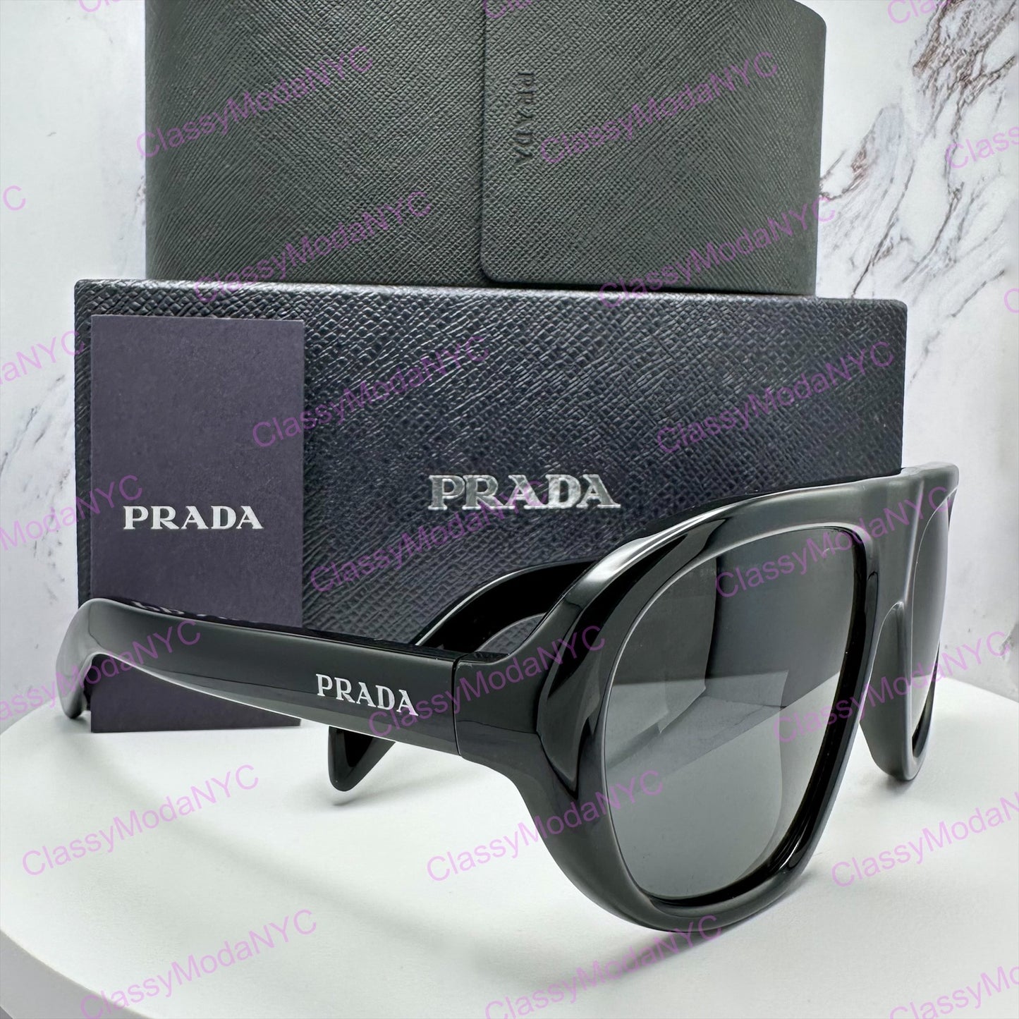 PR C05S 16K08Z Prada black sunglasses side view with box and case