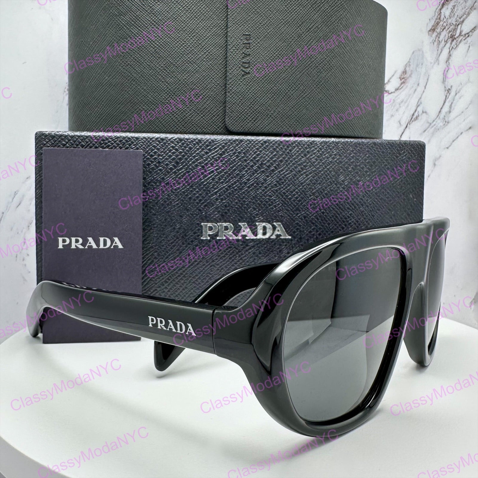 PR C05S 16K08Z Prada black sunglasses side view with box and case