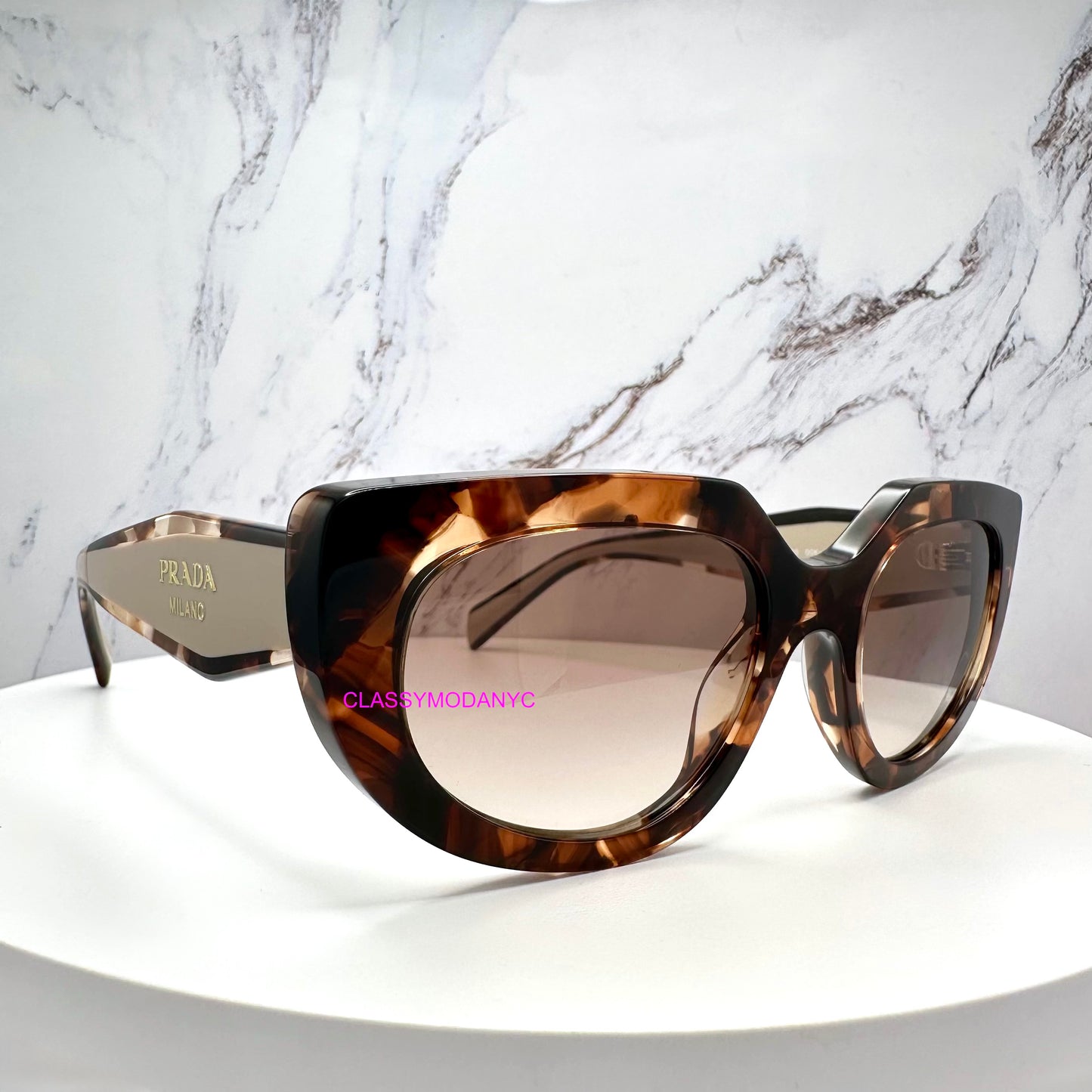 PR D02S 00K10S Prada sunglasses front view cat eye oval symbole gold logo 