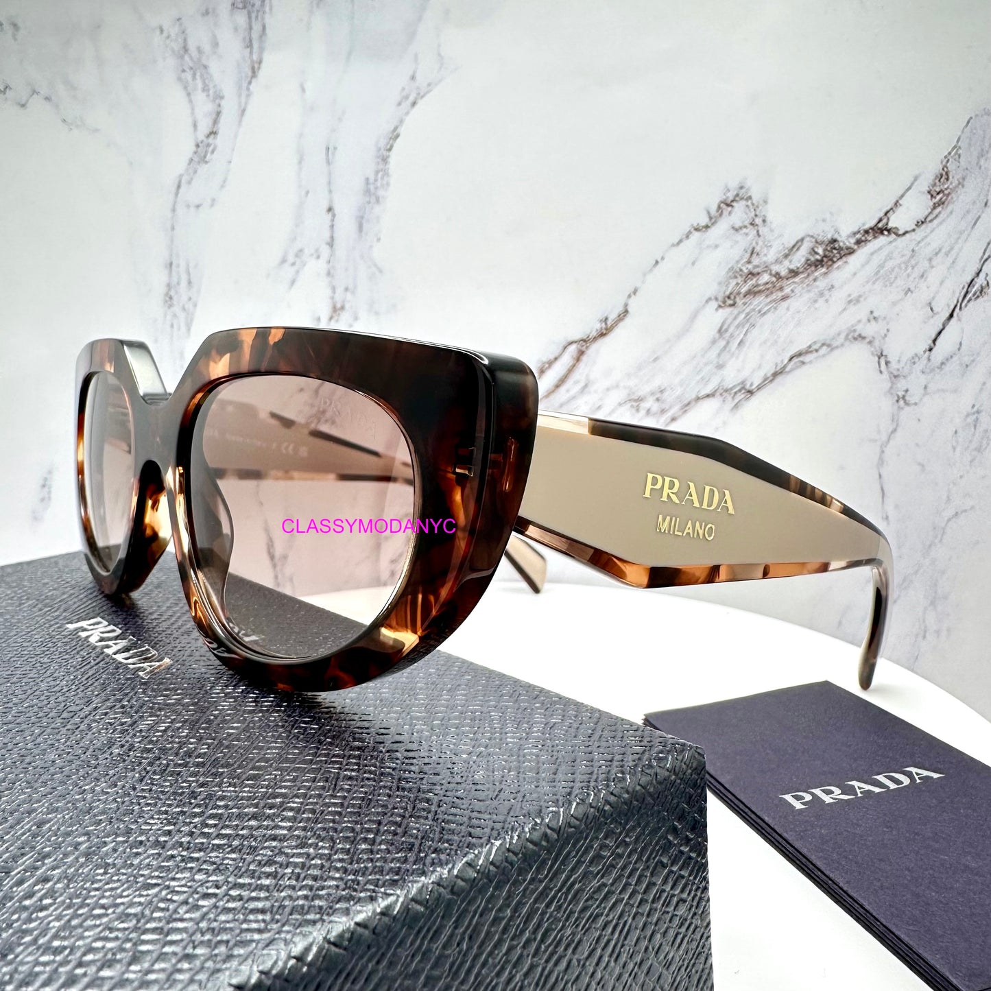 PR D02S 00K10S Prada sunglasses front view cat eye oval symbole gold logo 1