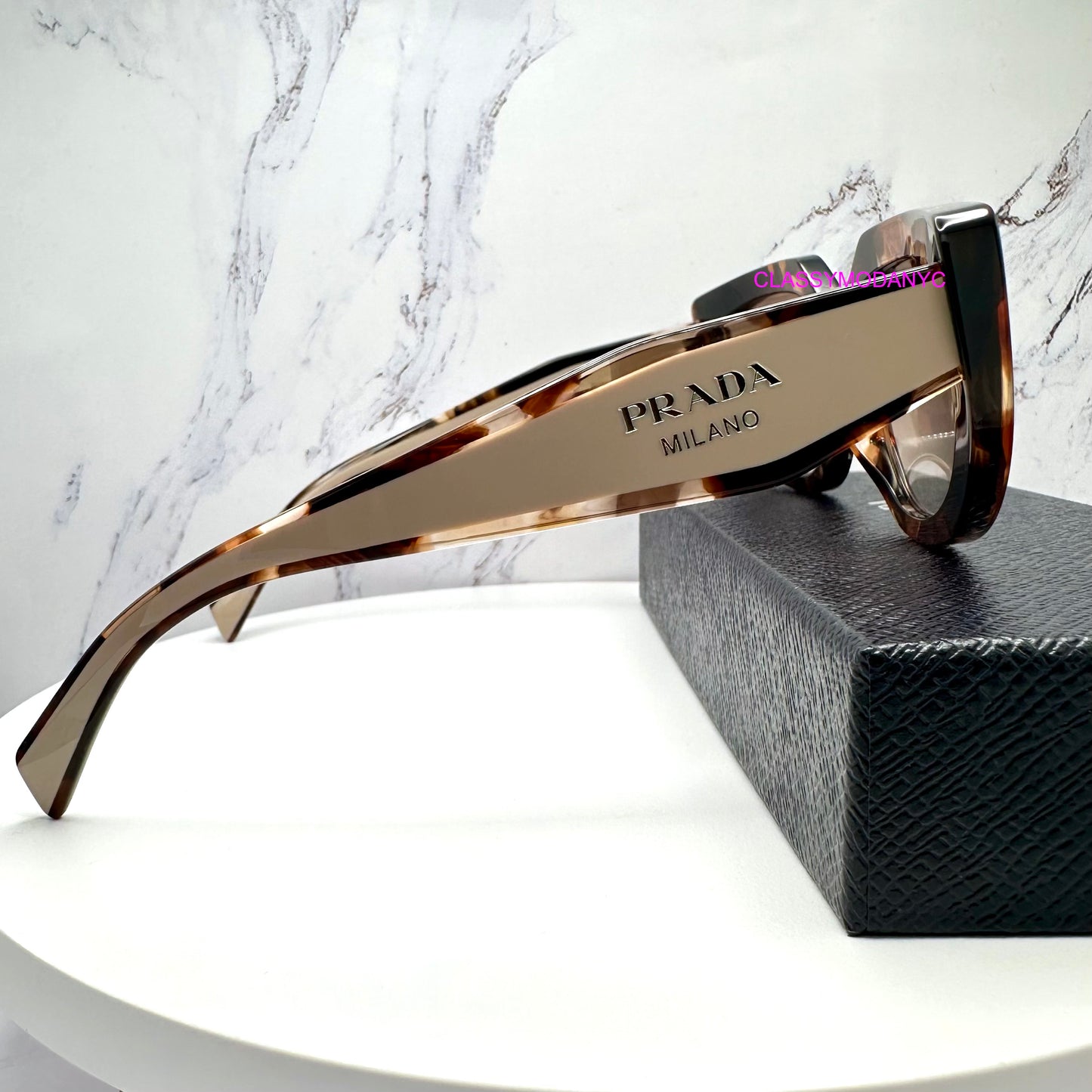 PR D02S 00K10S Prada sunglasses front view cat eye oval symbole gold logo 2