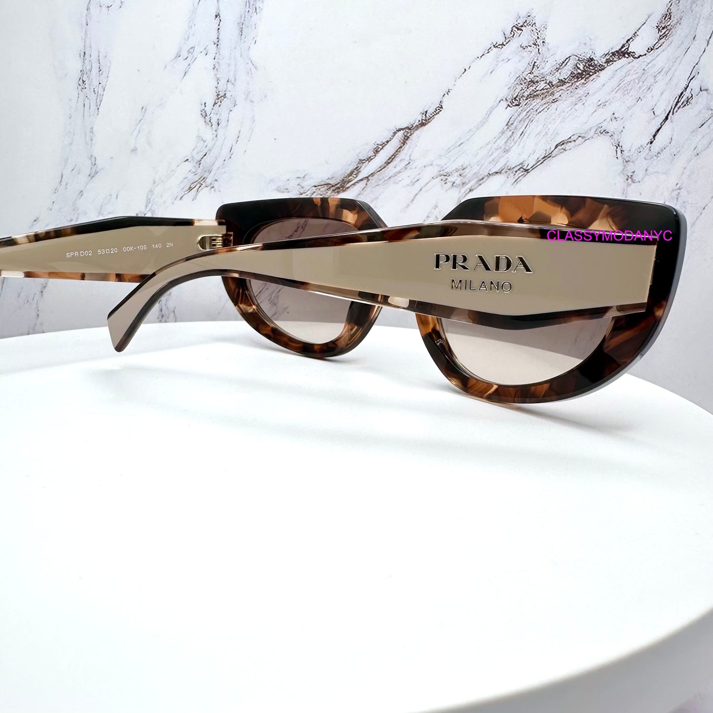 PR D02S 00K10S Prada womens brown tortoise caramel sunglasses side view oval symbole gold logo 