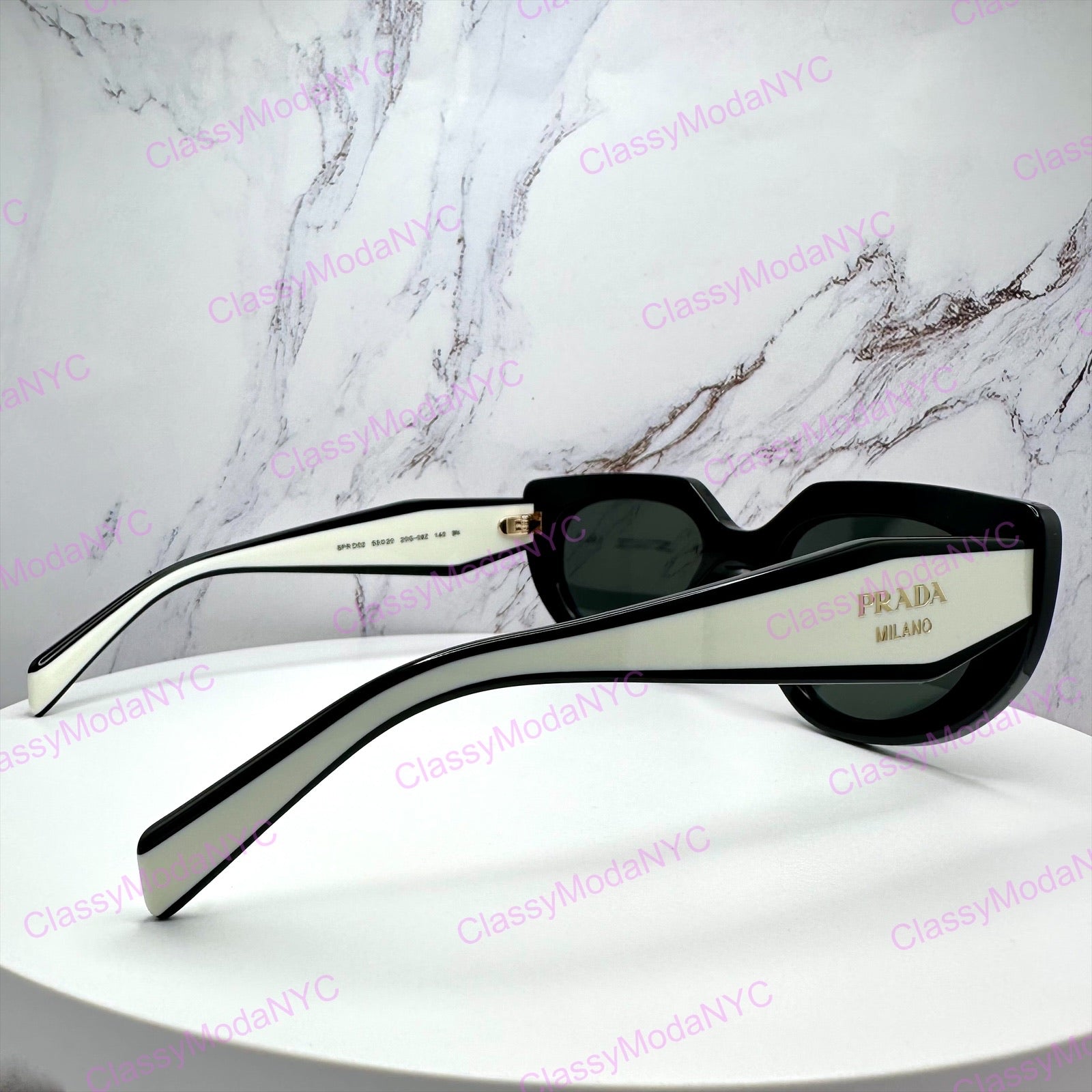 PR D02S 20G08Z Prada sunglasses side view gold Symbole logo