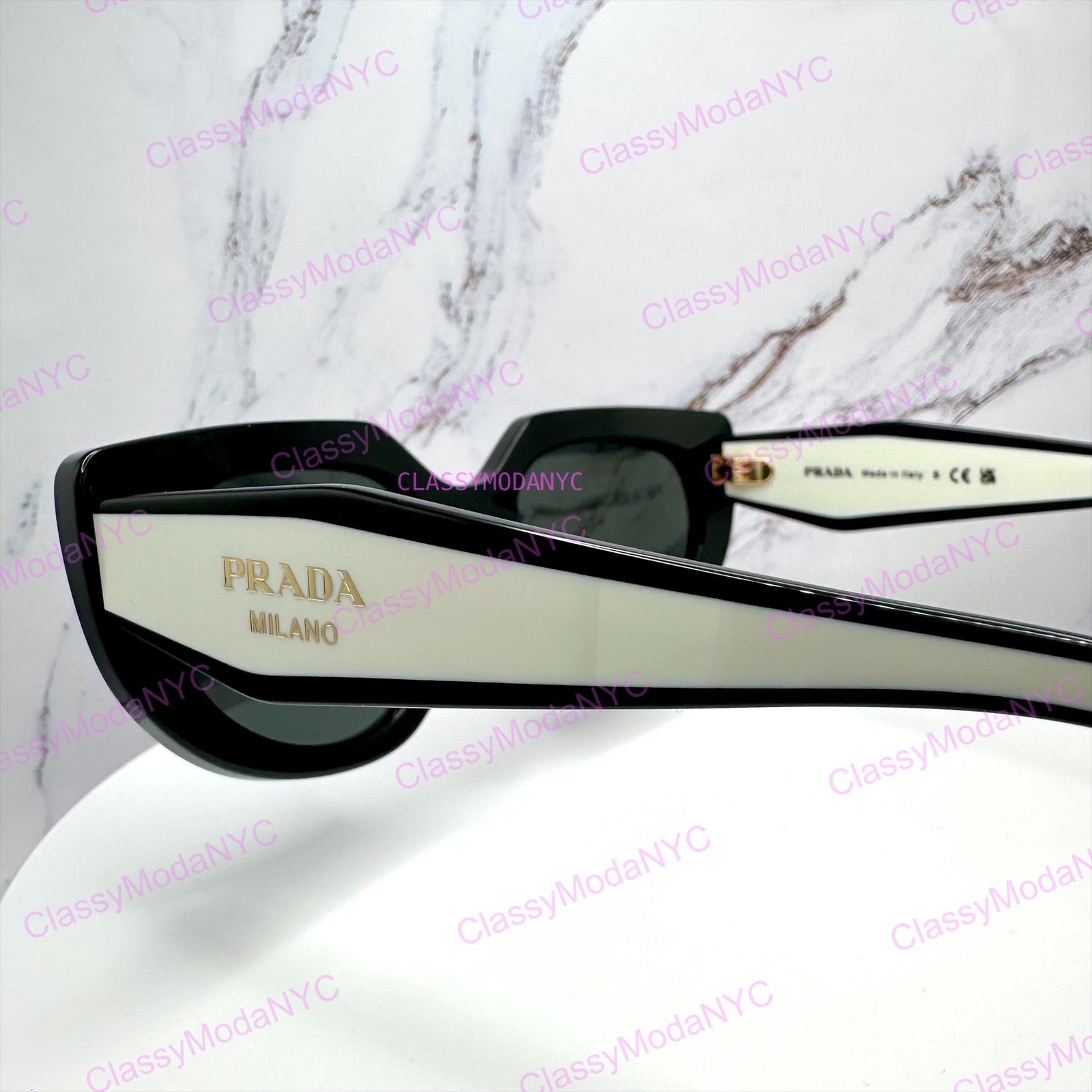 PR D02S 20G08Z Prada sunglasses side view gold Symbole logo