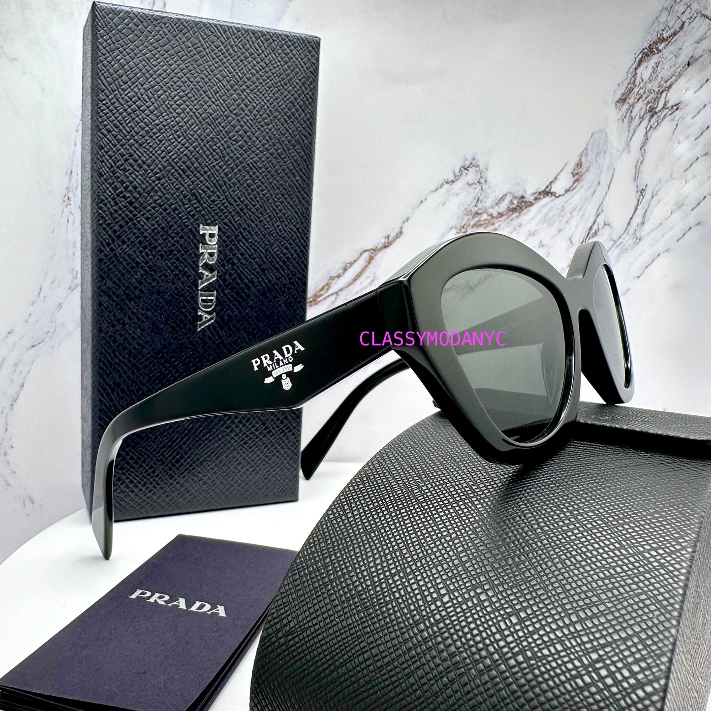 Prada sunglasses PRA02S 16K08Z black cat eye 