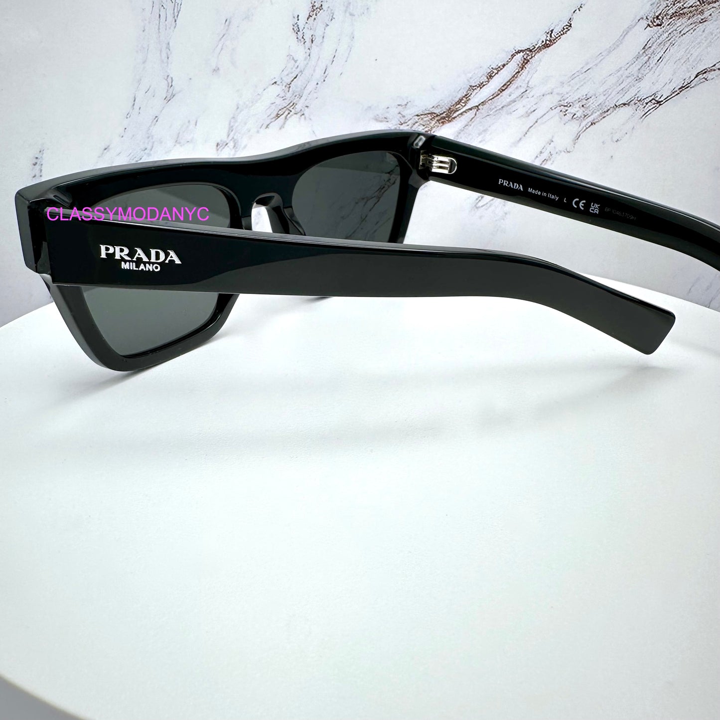 Prada PRC03S 16K08Z black square sunglasses on back arm view with logo 