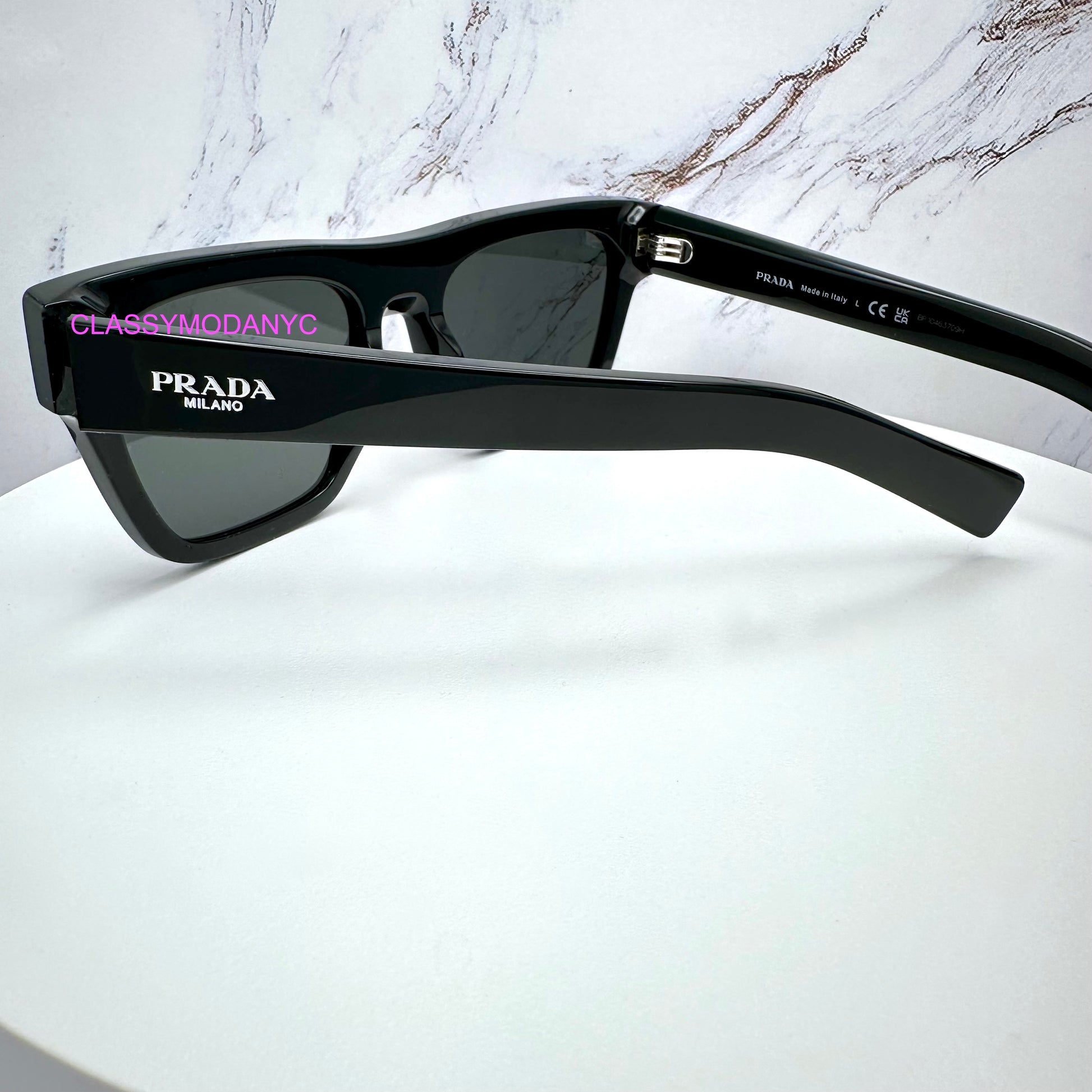 Prada PRC03S 16K08Z black square sunglasses on back arm view with logo 
