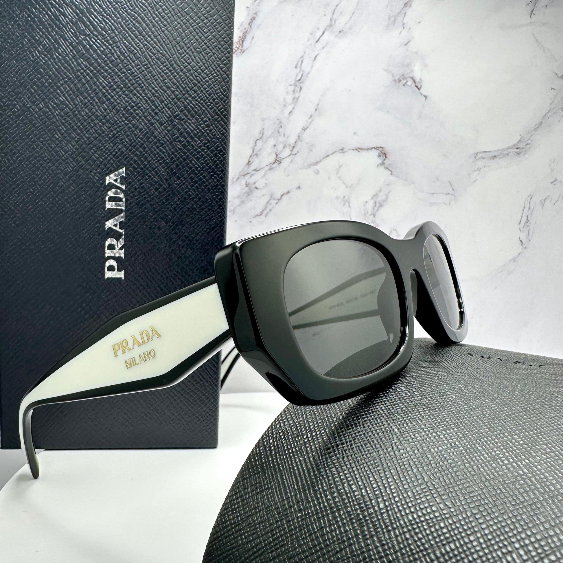 Prada PR B05S 09Q08Z black white rectangle symbole sunglasses side view