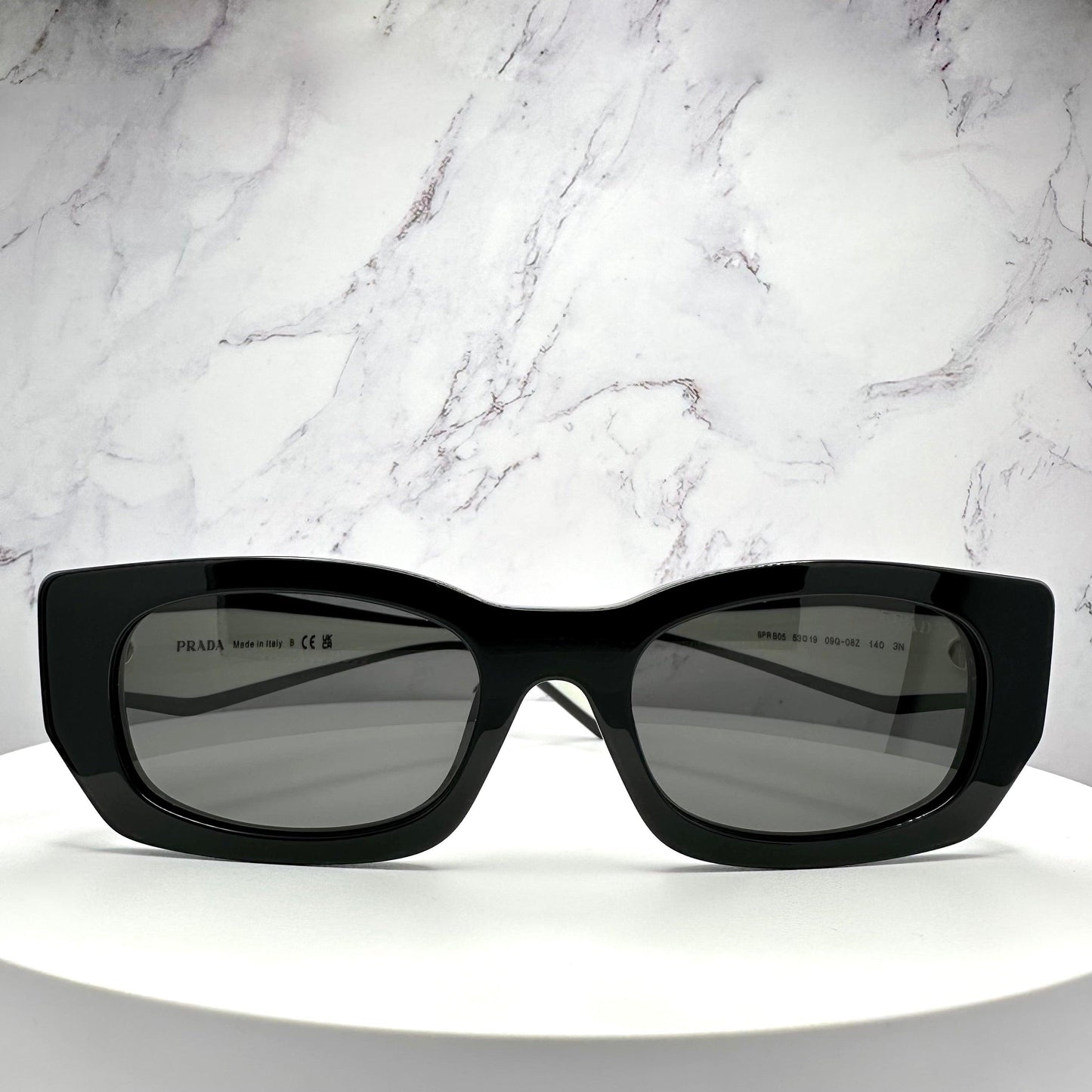 Prada 0PRB05S 09Q08Z black white rectangle symbole sunglasses front view