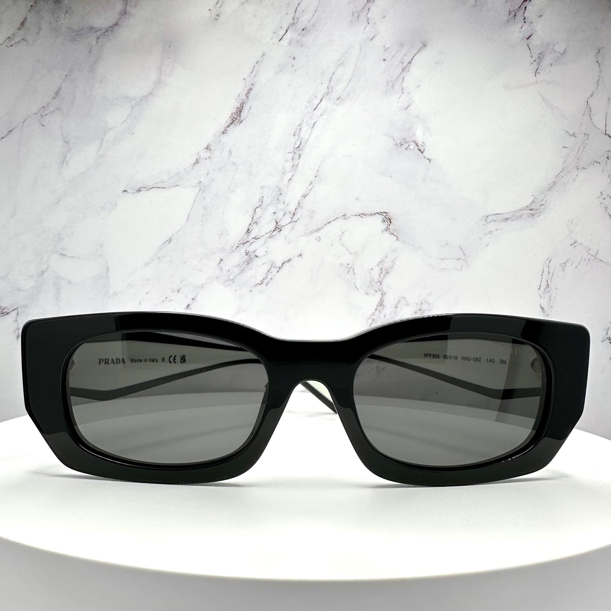 Prada 0PRB05S 09Q08Z black white rectangle symbole sunglasses front view
