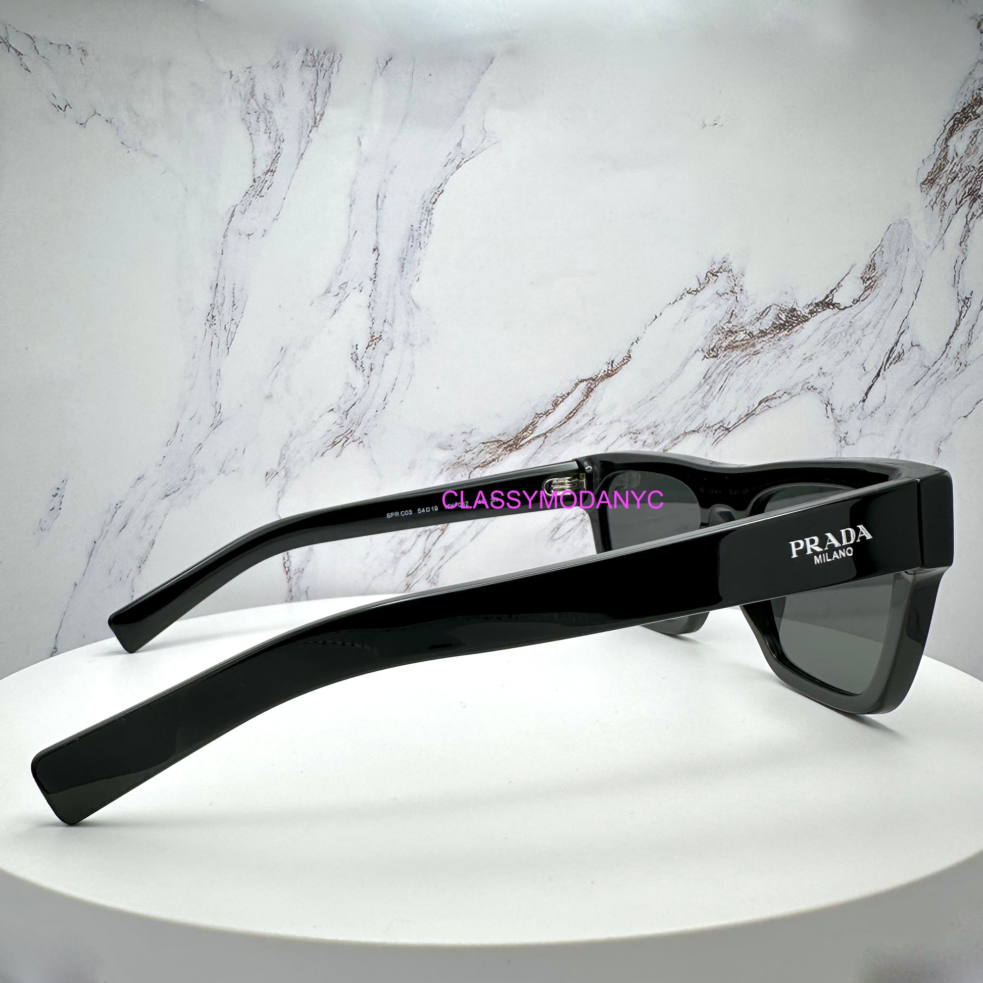 Prada PRC03S 16K08Z black sunglasses  with metallic side logo 