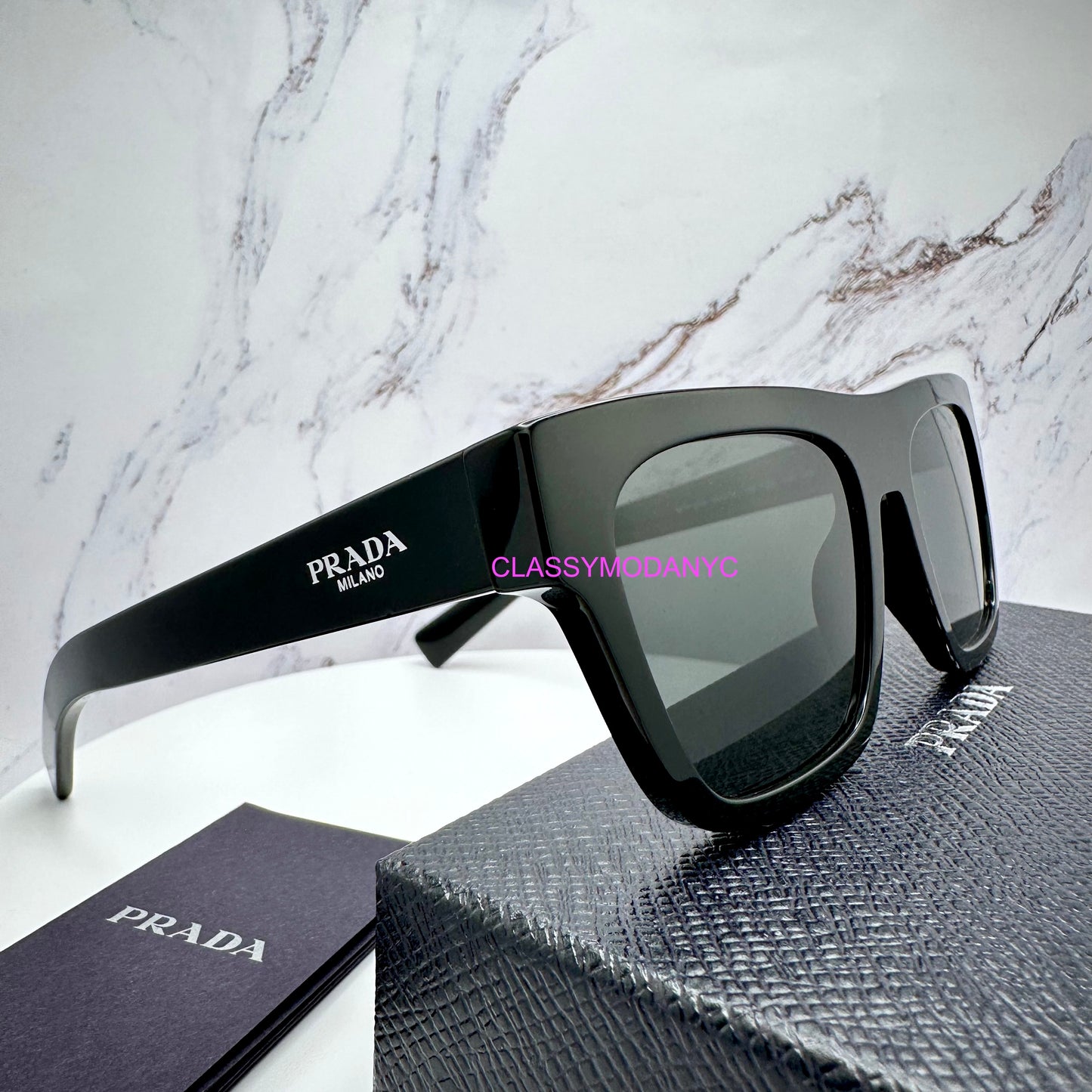 Prada SPRC03 16K08Z black sunglasses  with metallic side logo angle view for men