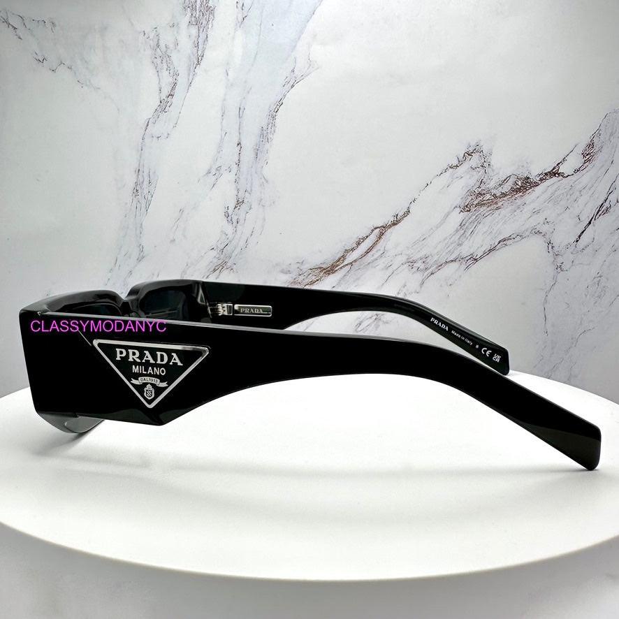 PRADA PR09ZS 1AB5S0 black sunglasses side view with metal logo.