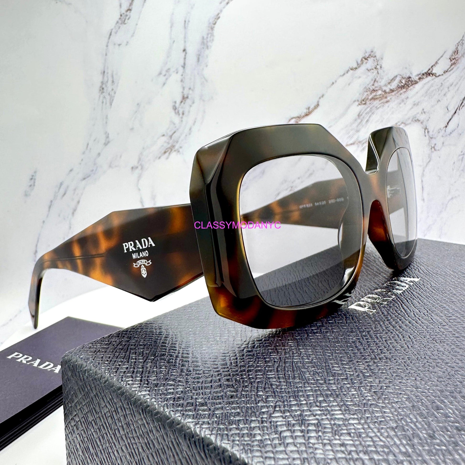 Prada PRB23S 20D50Q juniper tortoise grey lens symbole sunglasses side view with box.