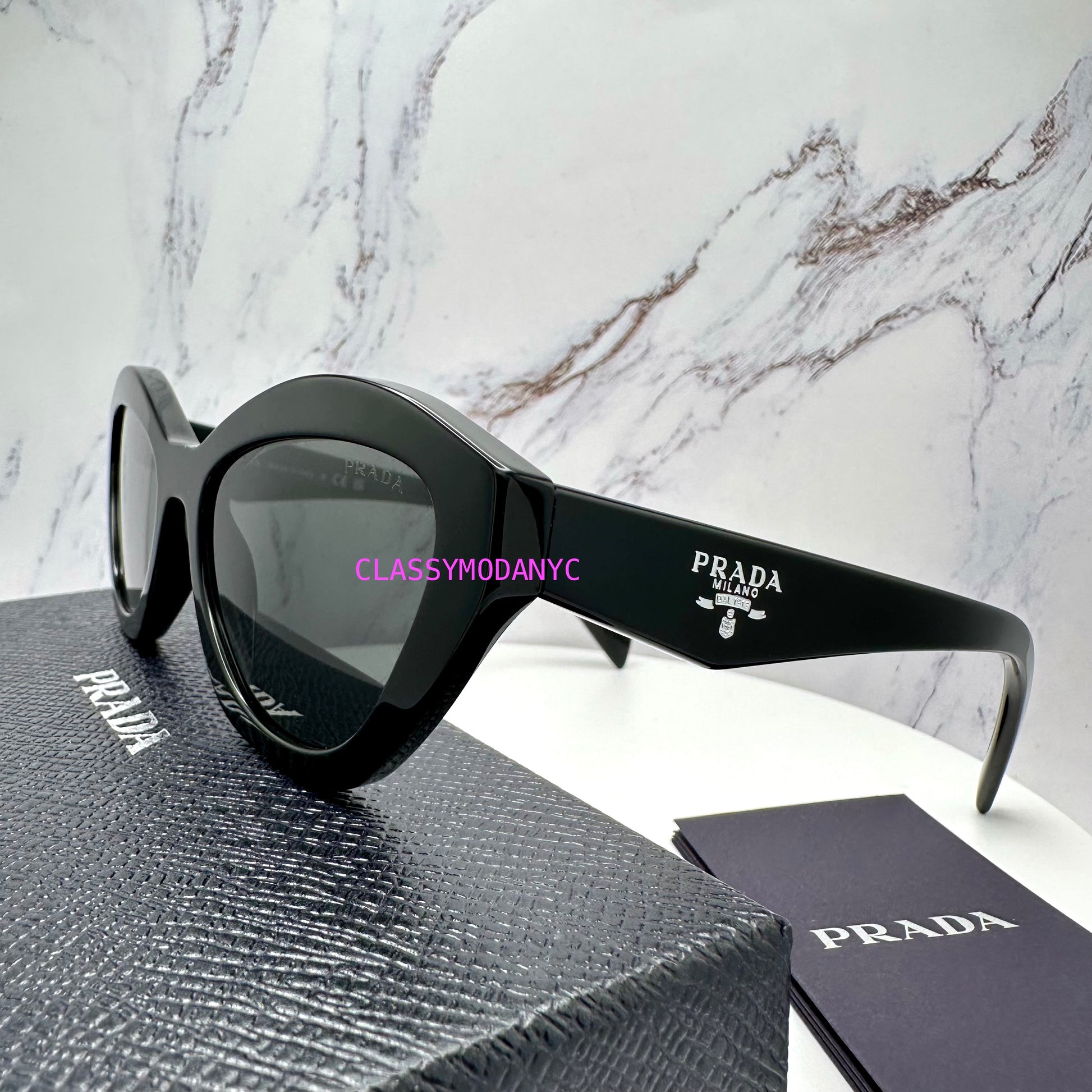 Prada sunglasses PRA02S 16K08Z womens grey lens 