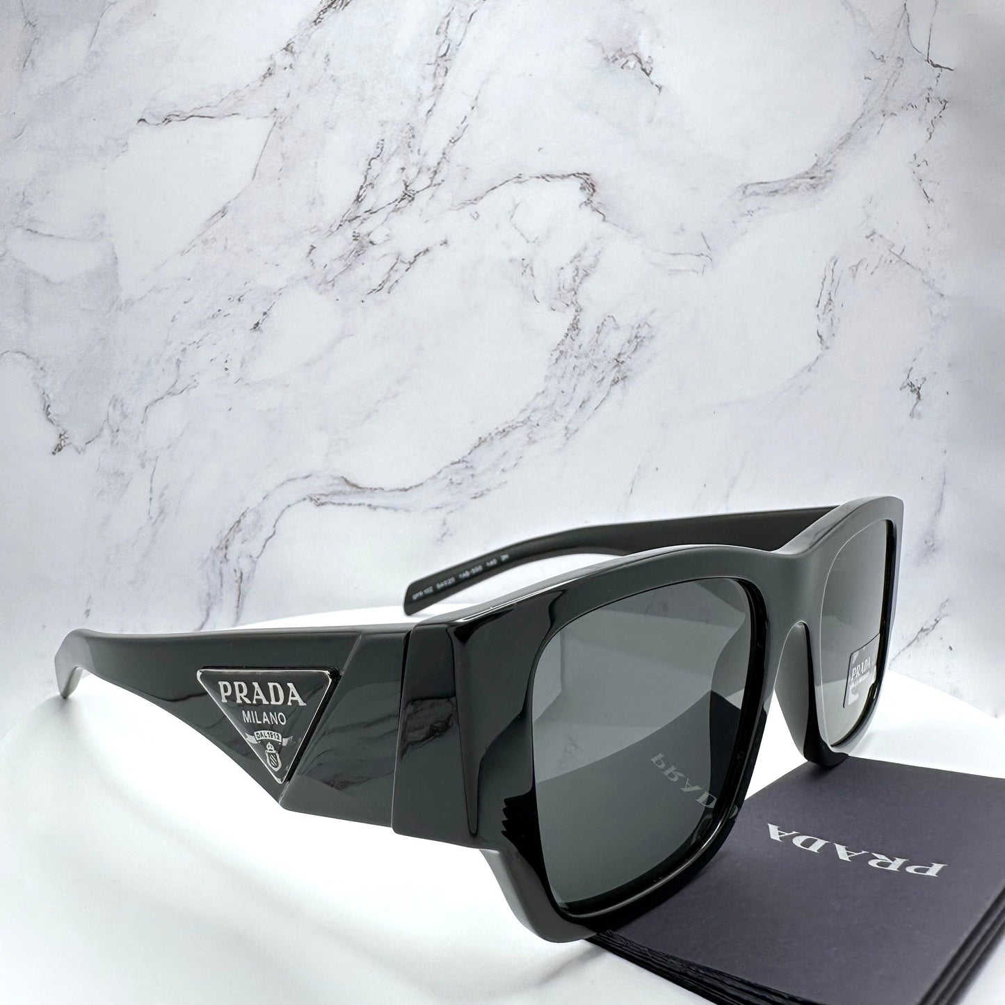 Prada PR10ZS 1AB5S0 black sunglasses triangle logo