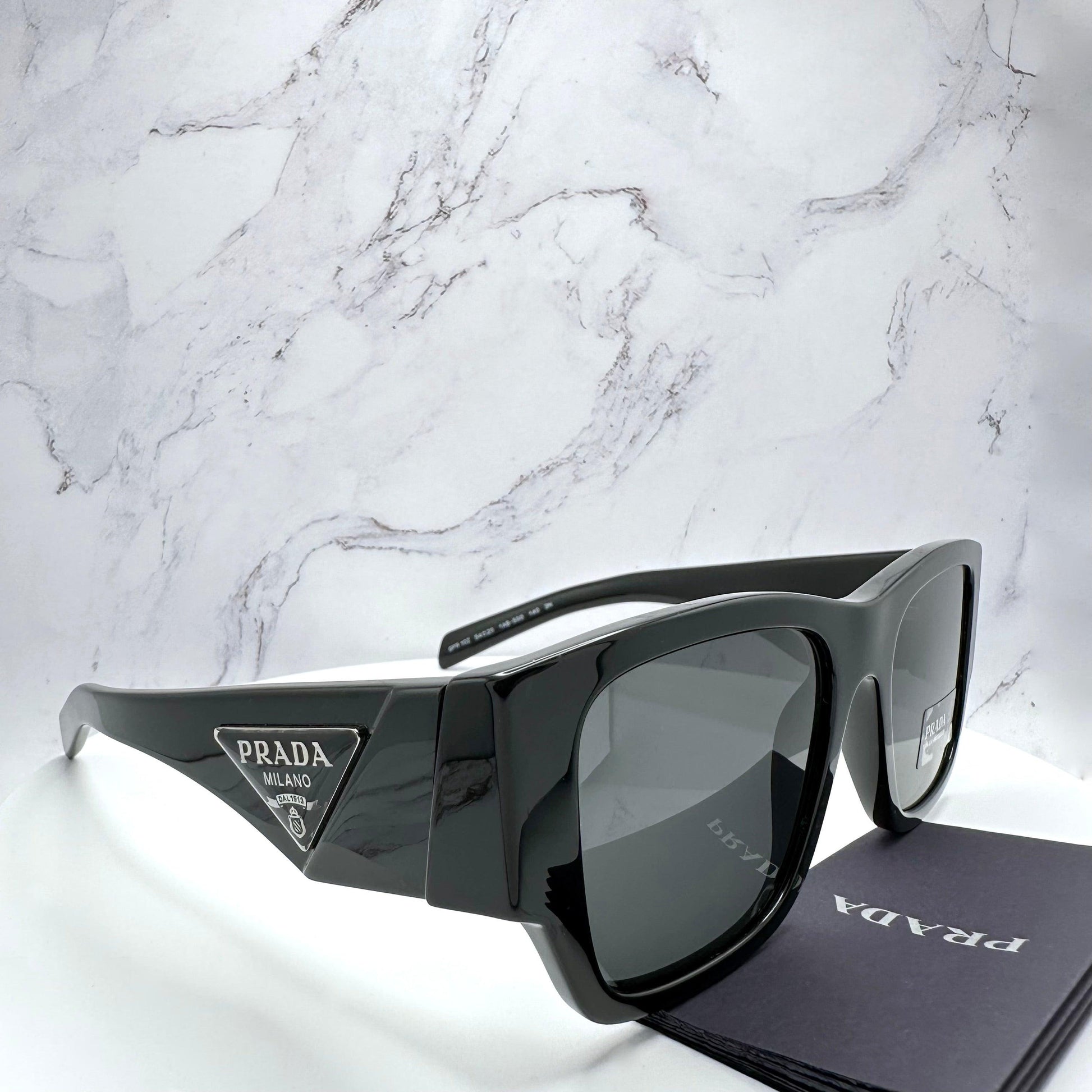 Prada PR10ZS 1AB5S0 black sunglasses triangle logo