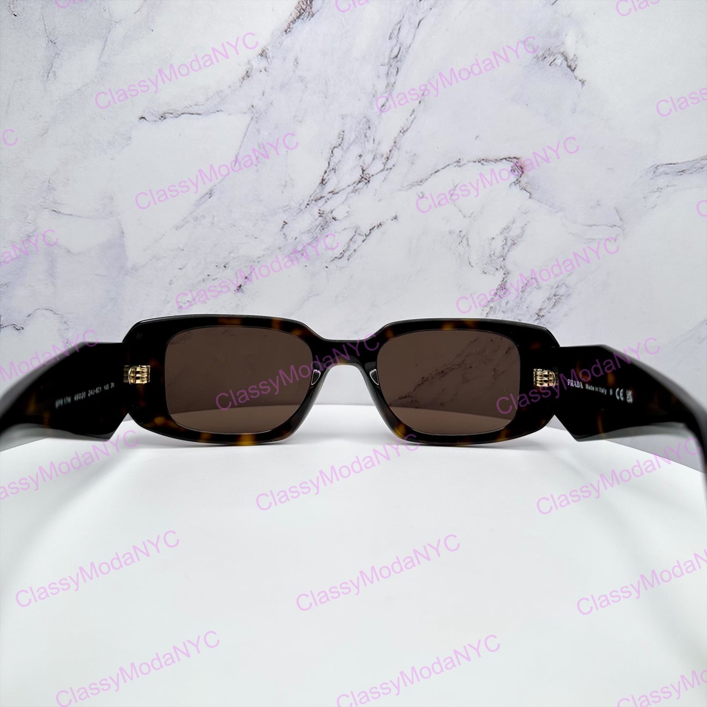 SPR17W 2AU8C1 Prada brown sunglasses gold logo back view 