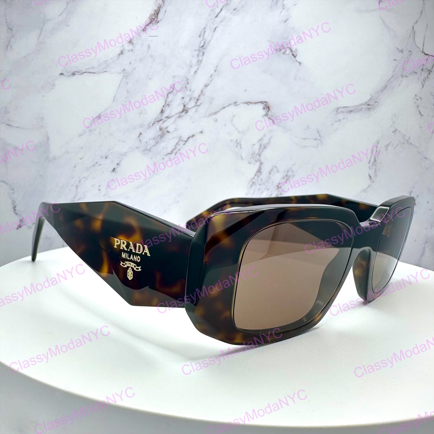 SPR17W 2AU8C1 Prada brown sunglasses gold logo side view 