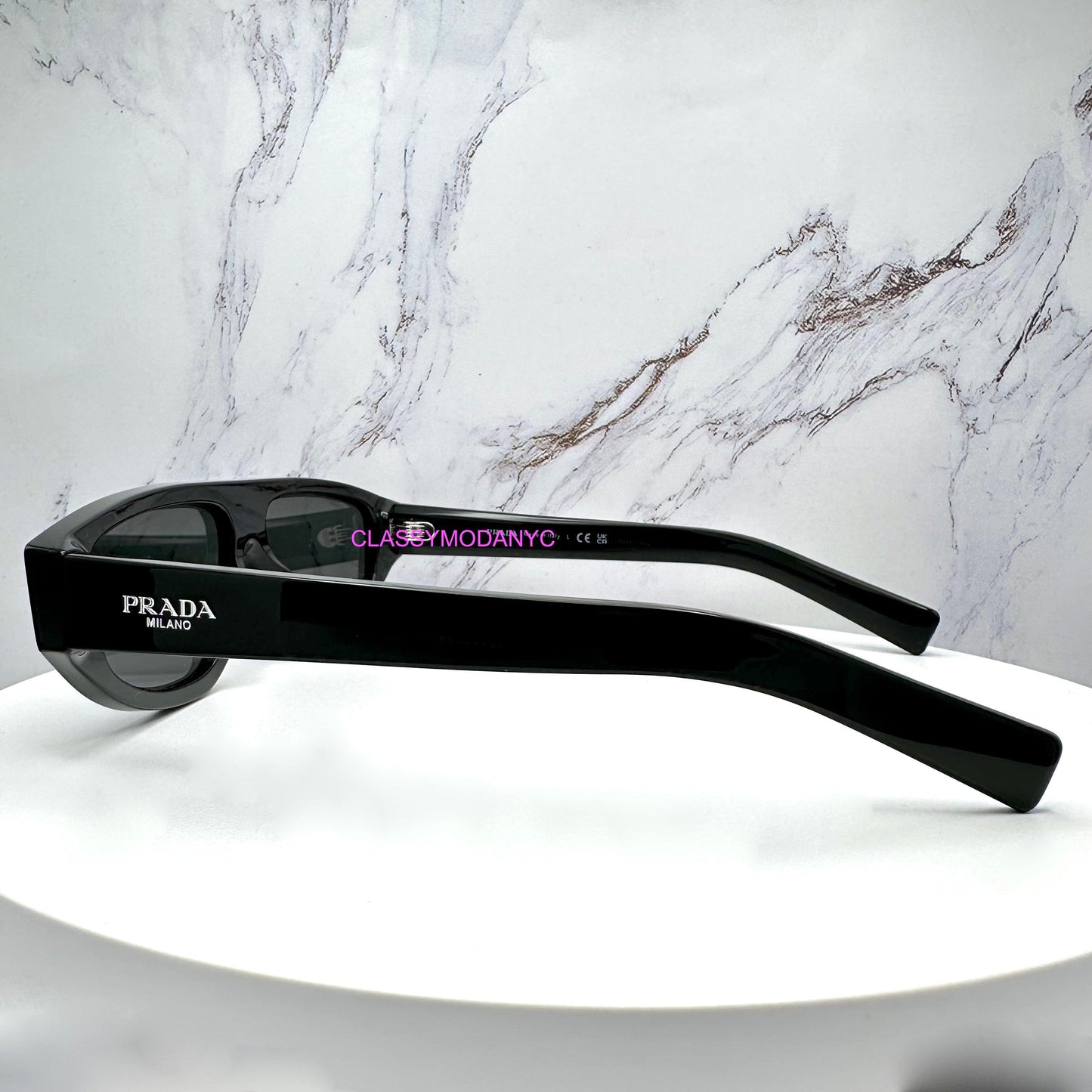 Prada 0PRC02S 16K08Z side view of Symbole logo temple arm.