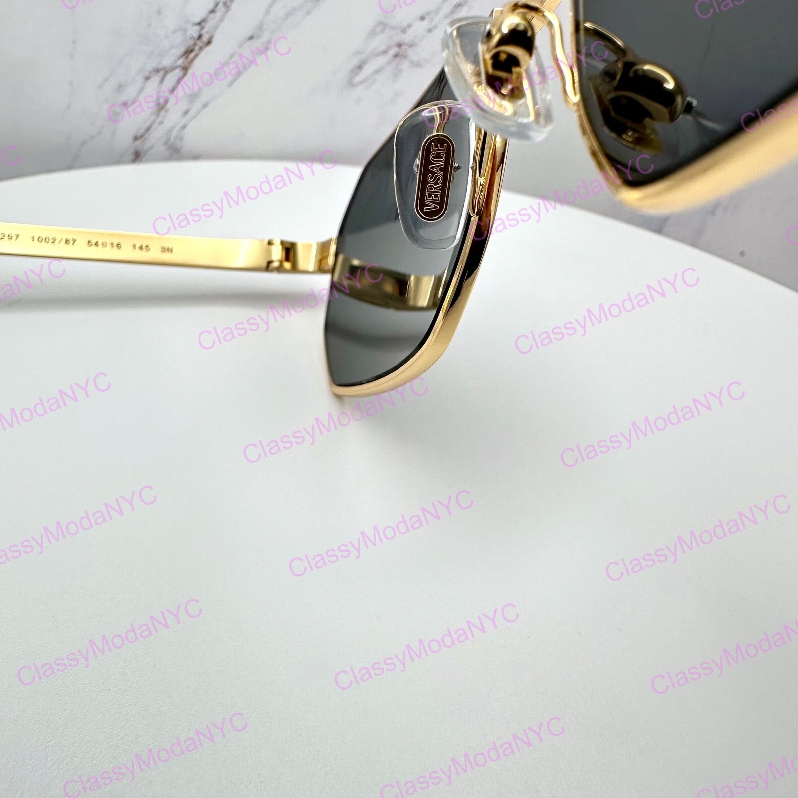 VE2297 100287 Versace gold metal sunglasses with adjustable nose pads