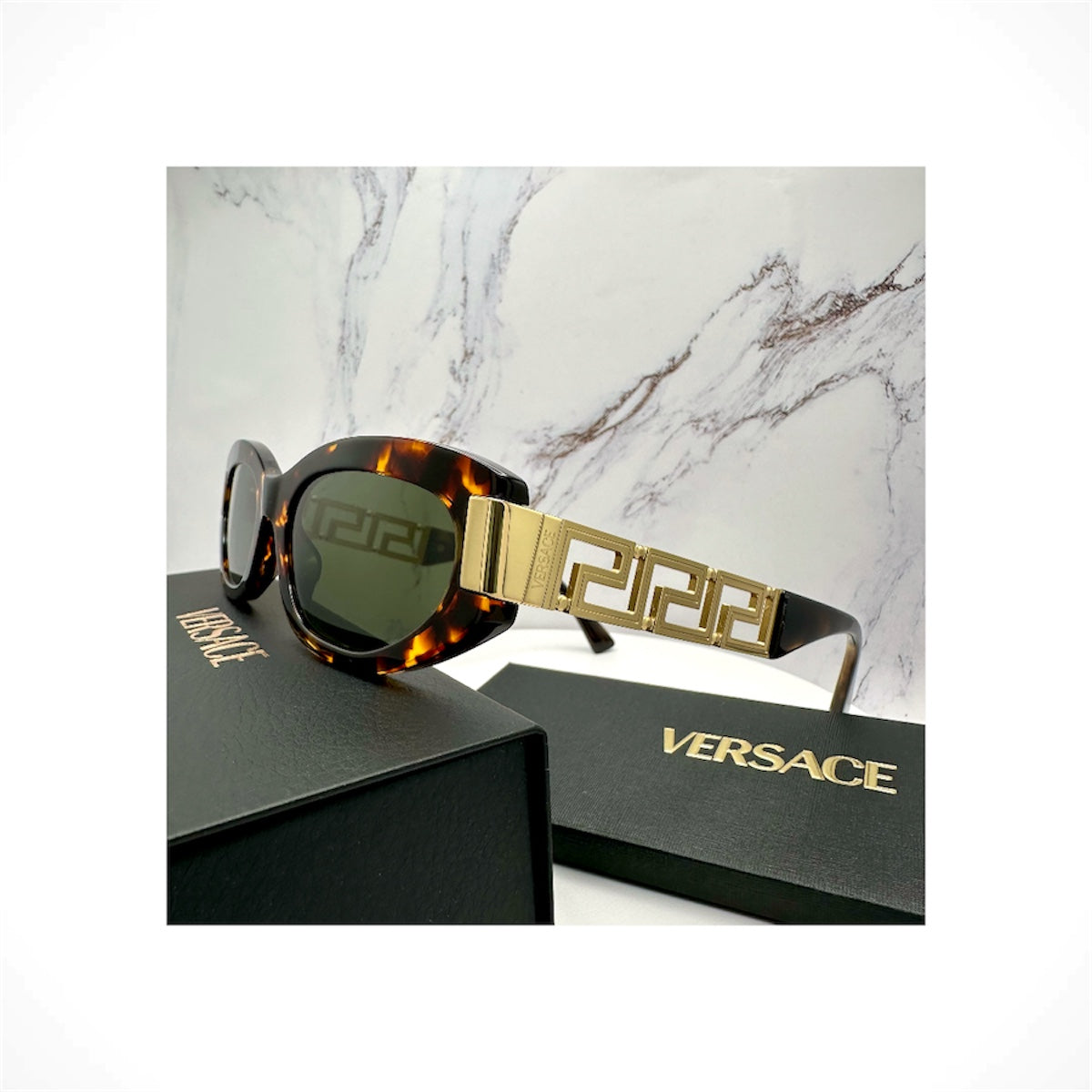 VERSACE VE4501 551471 brown tortoise oval cat eye unisex sunglasses with gold metal temples and dark green lenses.