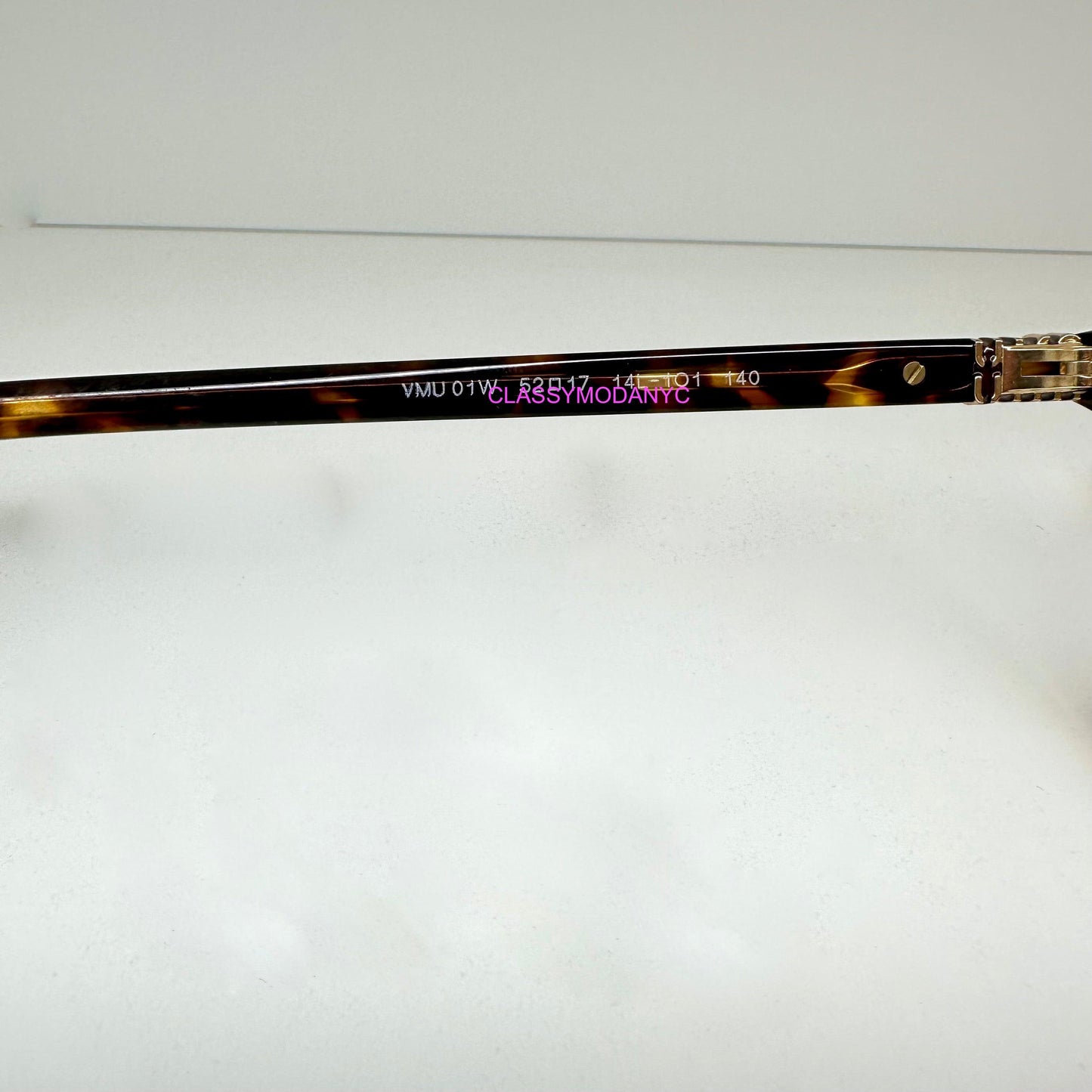 Miu Miu 0MU01WV 14L1O1 brown tortoise eyeglasses