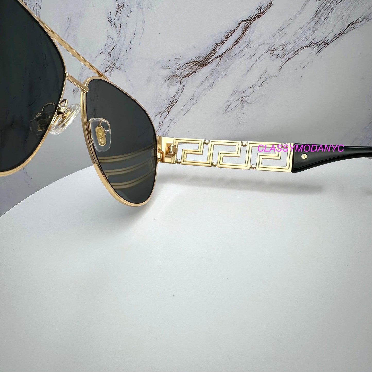 VERSACE 0VE2289 1002/87 gold aviator men's sunglasses with adjustable nose pads.